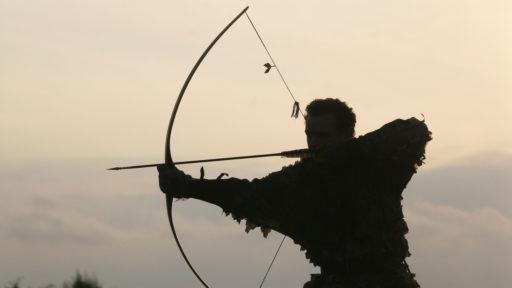 Chasseur à l'arc traditionnel