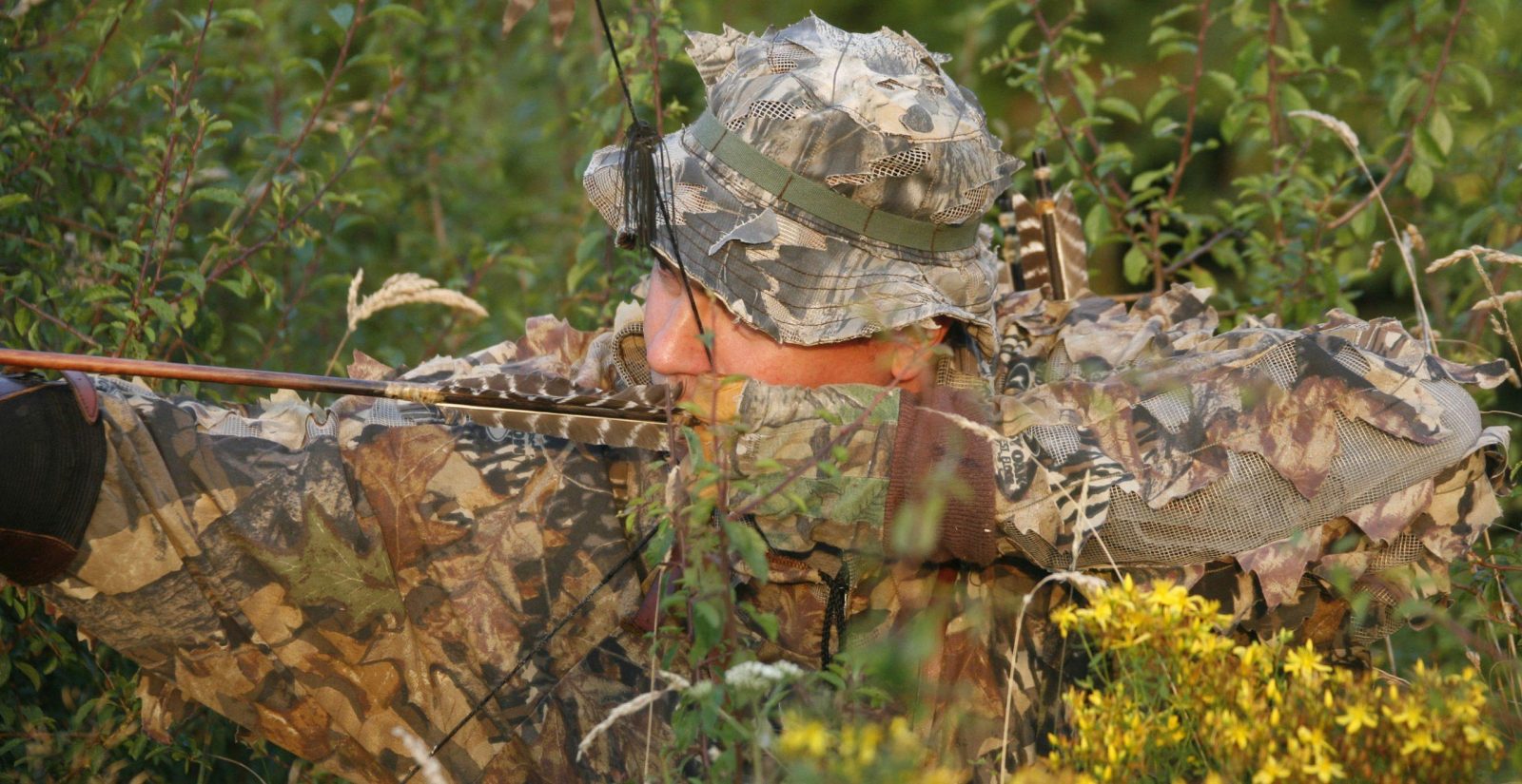 chasse à l'arc chasseur forêt